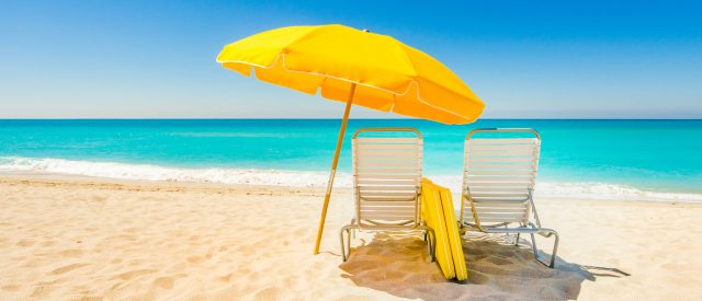 Beach chairs and umbrella