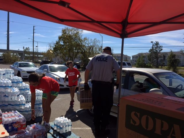 Hurricane volunteers handing out water